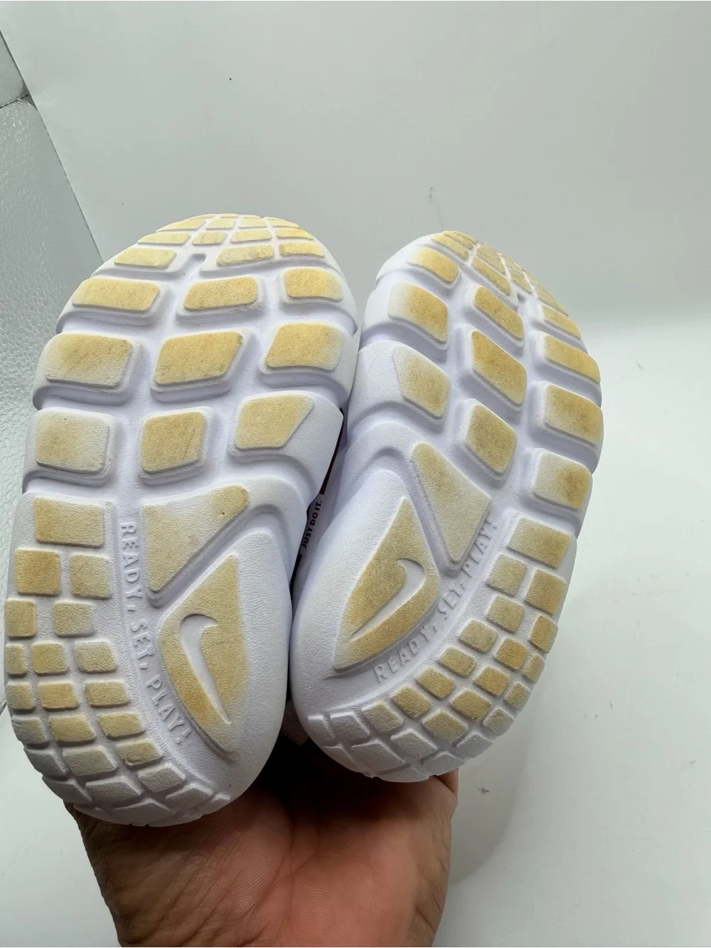 Nike Kids White Sneakers with Purple Strap and Gold Swoosh